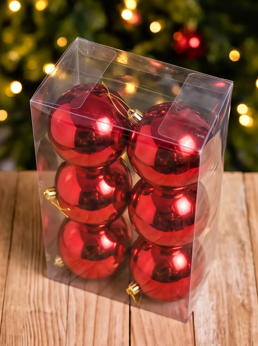 red-6cm-christmas-baubles-tree-decoration-india.webp Red 6 cm baubles decorating an artificial Christmas tree